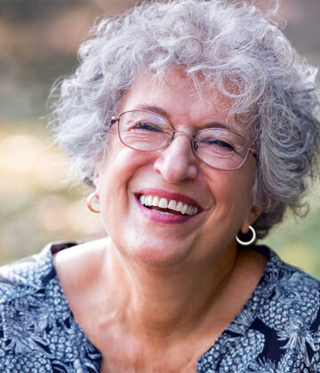 Four Reasons To Choose Dental Implants Over Dentures or Bridges